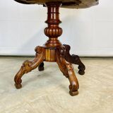 Violin-shaped pedestal table