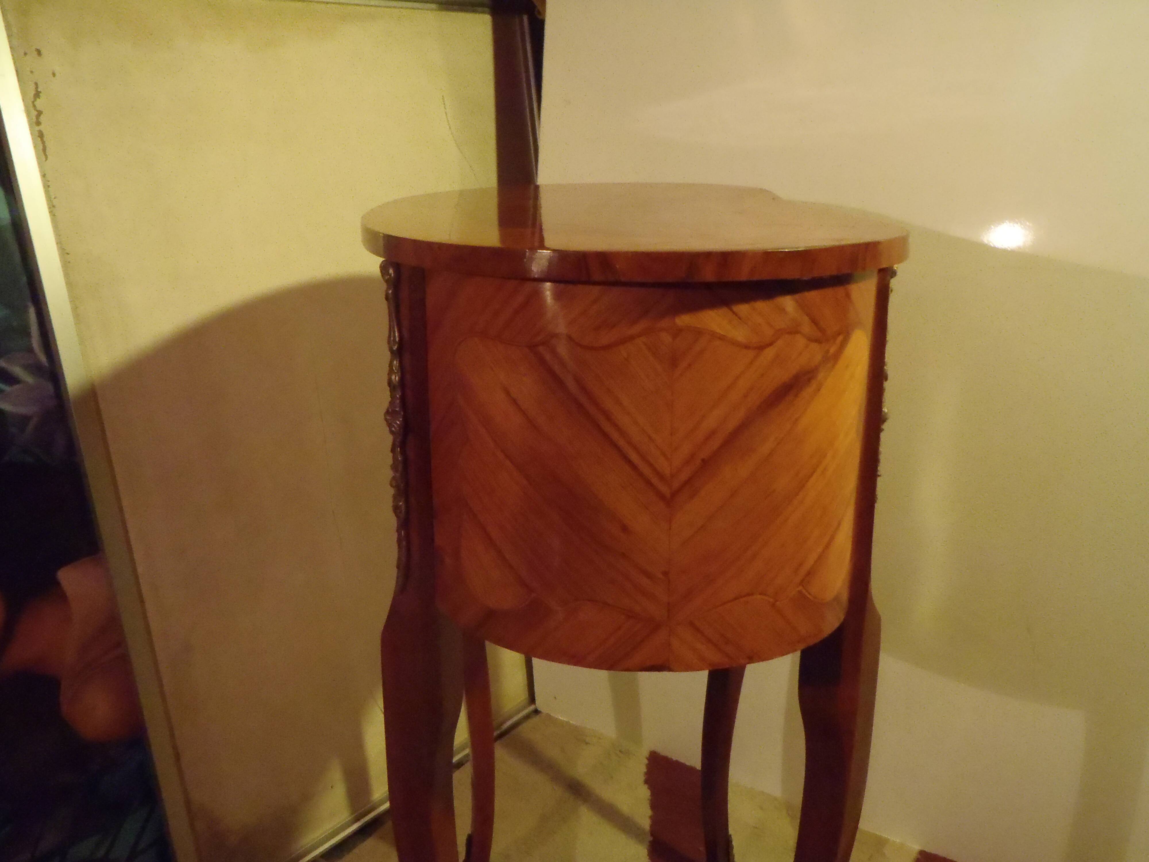 Louis XV style bedside table with varnished marquetry.