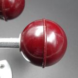 Two hooks in red bakelite and metal - around 1950