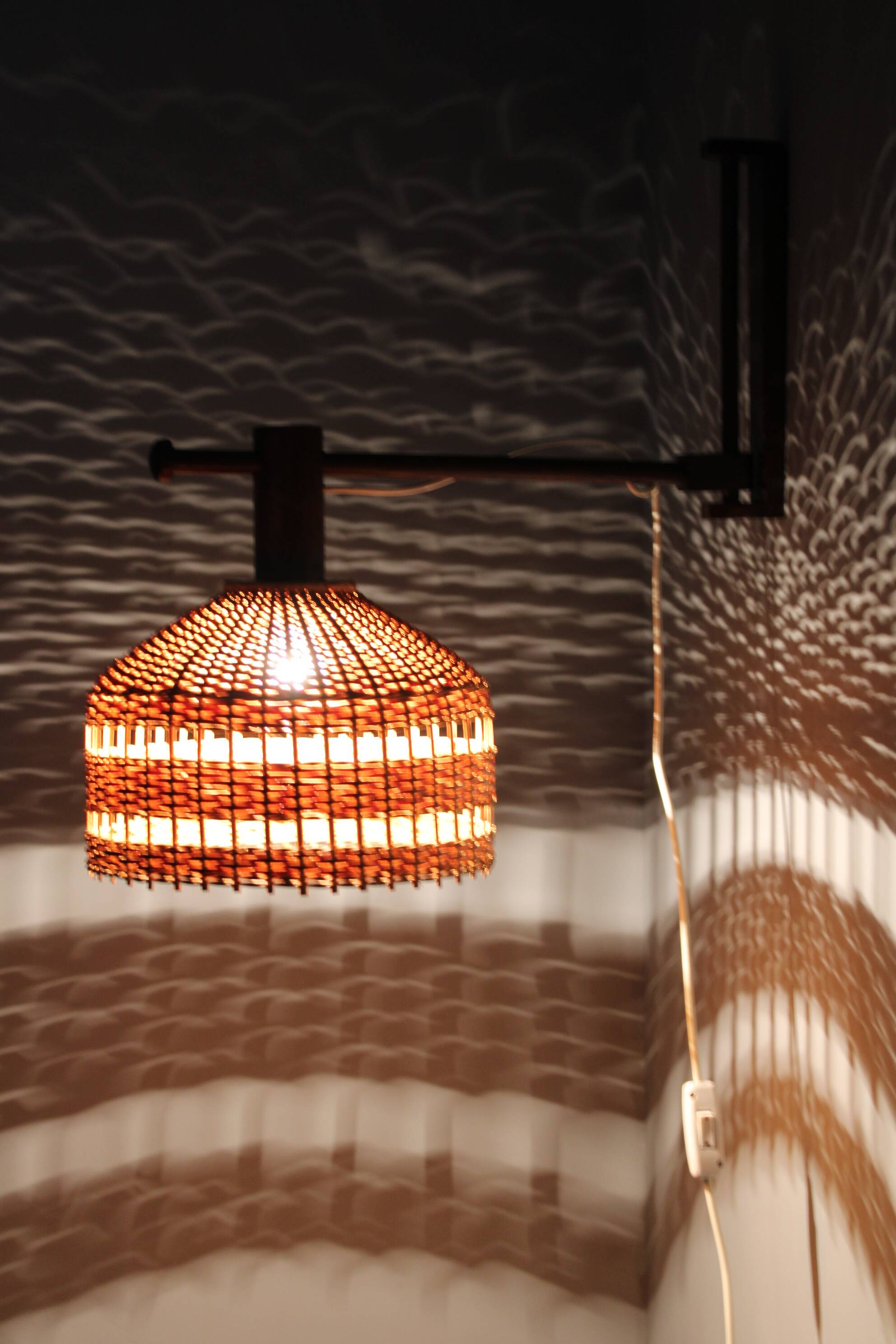 Adjustable mid-century wooden wall lamp with rattan shade, 1970s