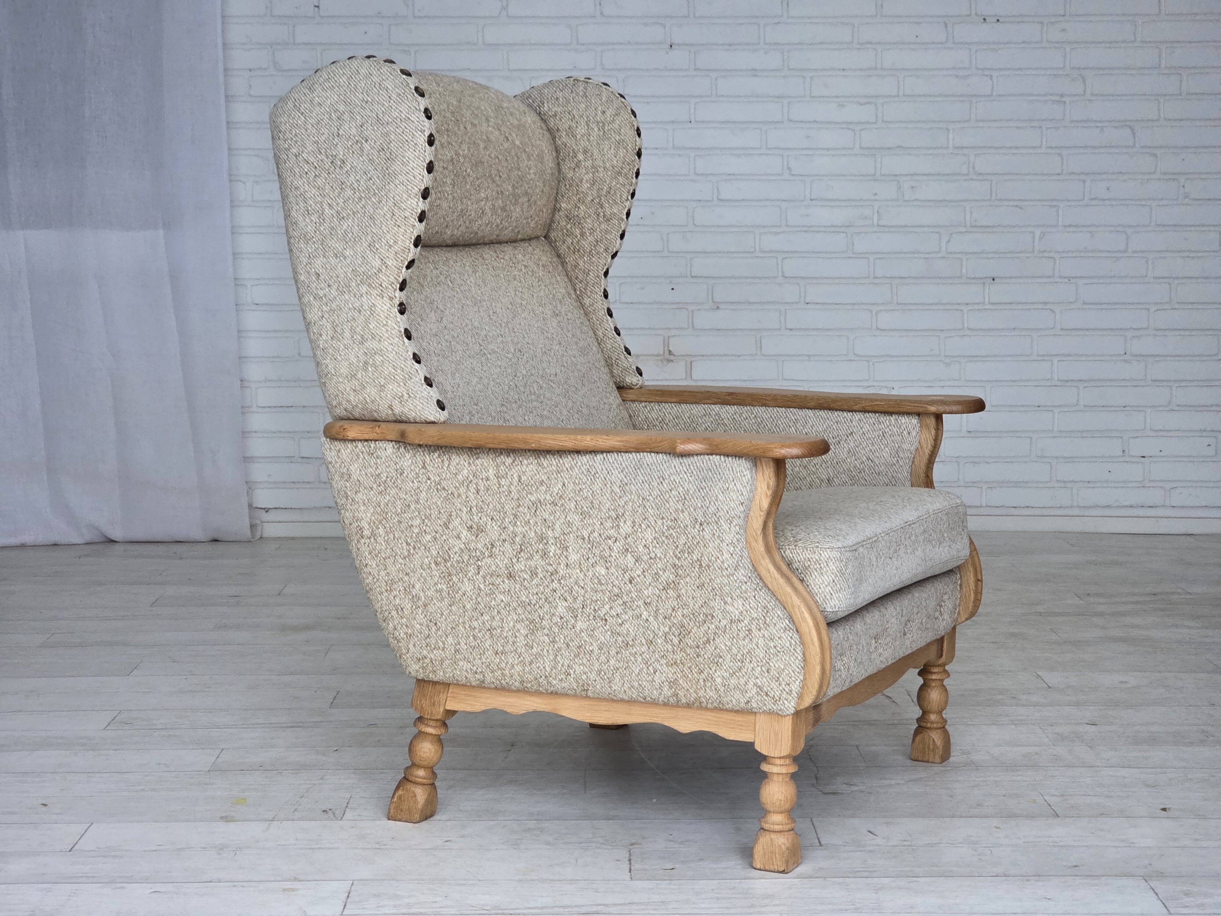1970s, Danish highback armchair, furniture wool, solid oak wood.
