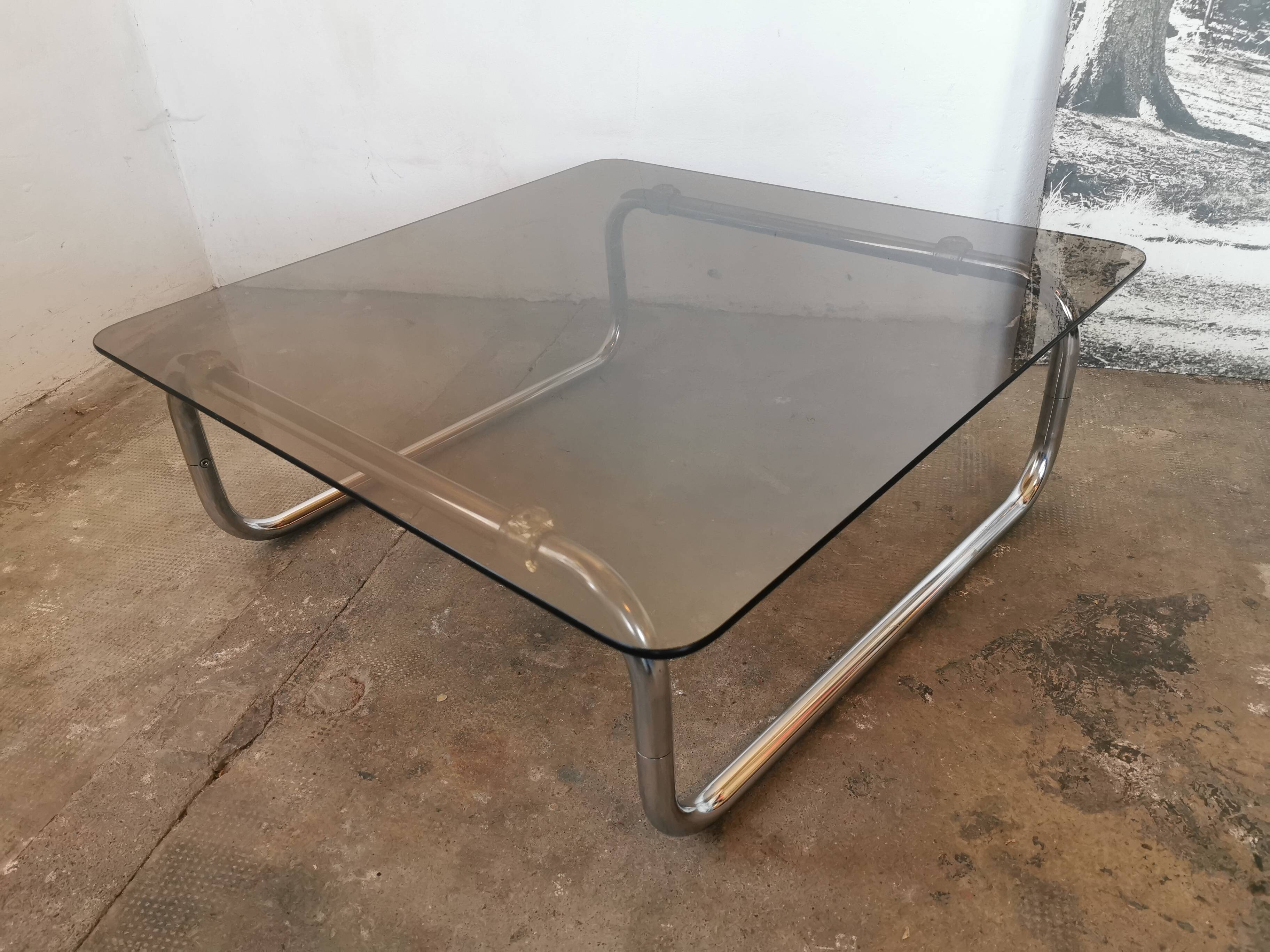 Chrome tubular metal and smoked glass coffee table