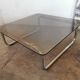 Chrome tubular metal and smoked glass coffee table
