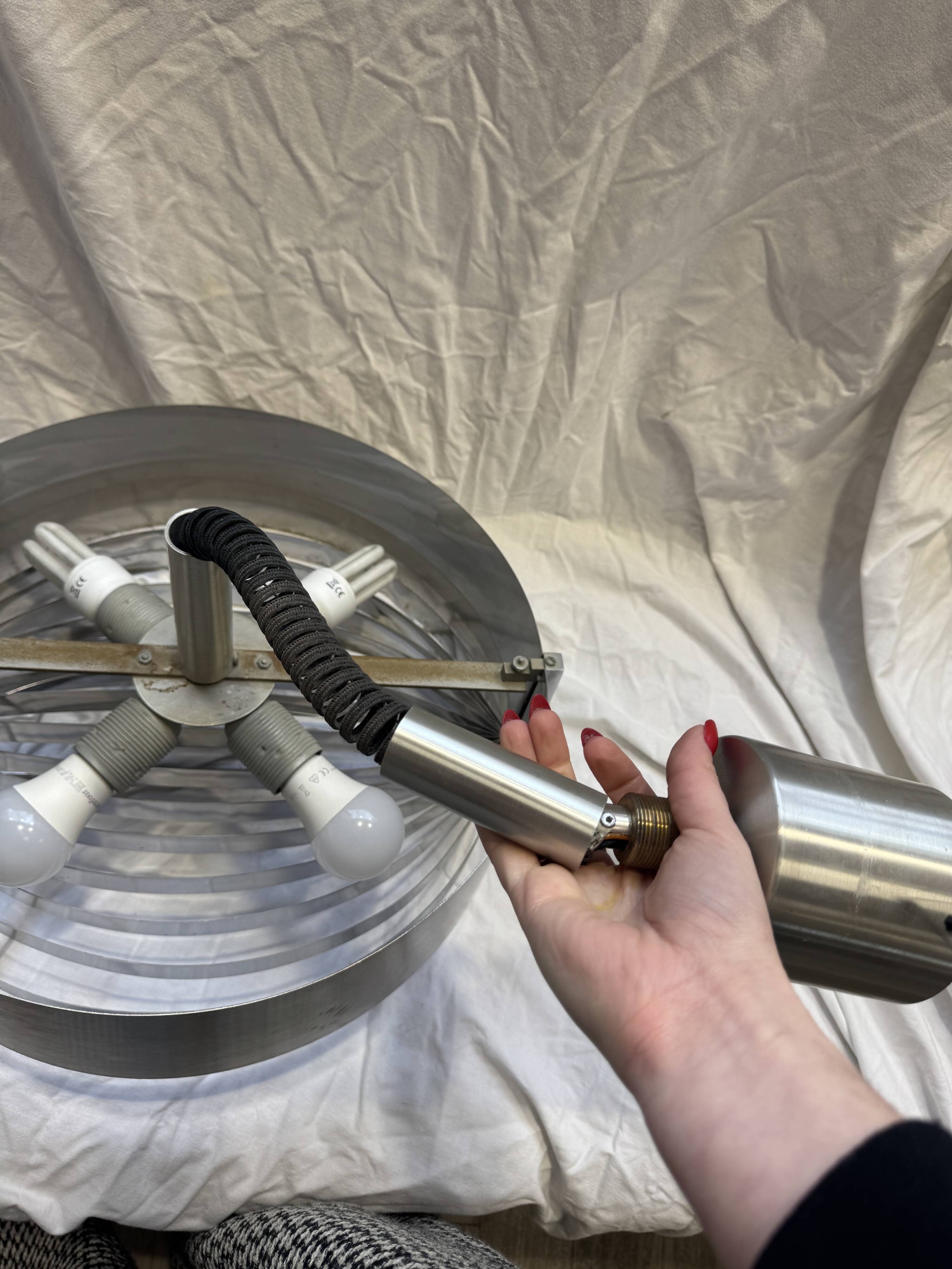 Brushed steel suspension