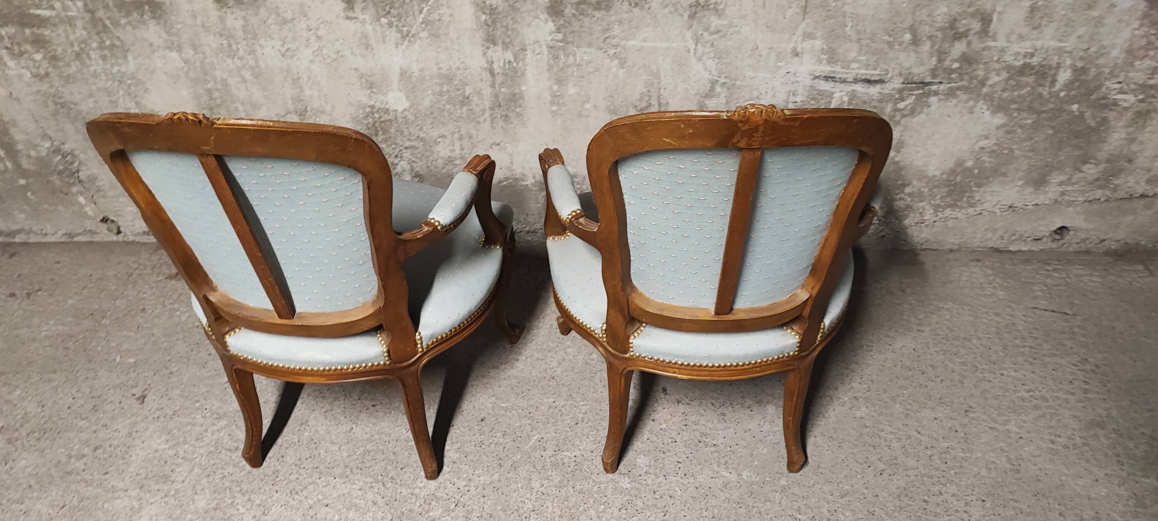 Reupholstered Louis XV convertible armchairs