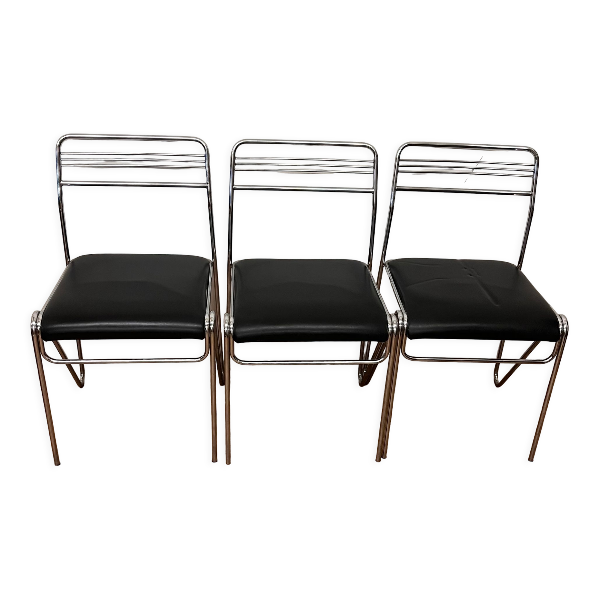 Three chrome and skai chairs from the 70s