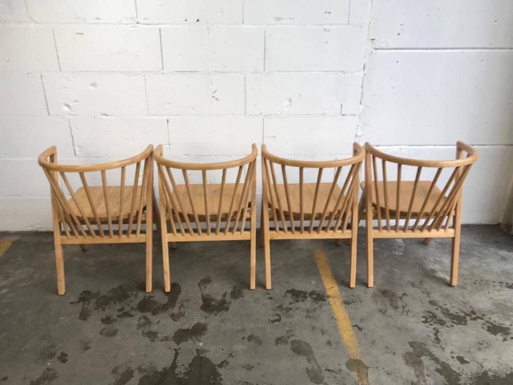 4 V-shaped wooden bistro chairs