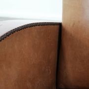Art Deco design armchair in light cognac cowhide leather.