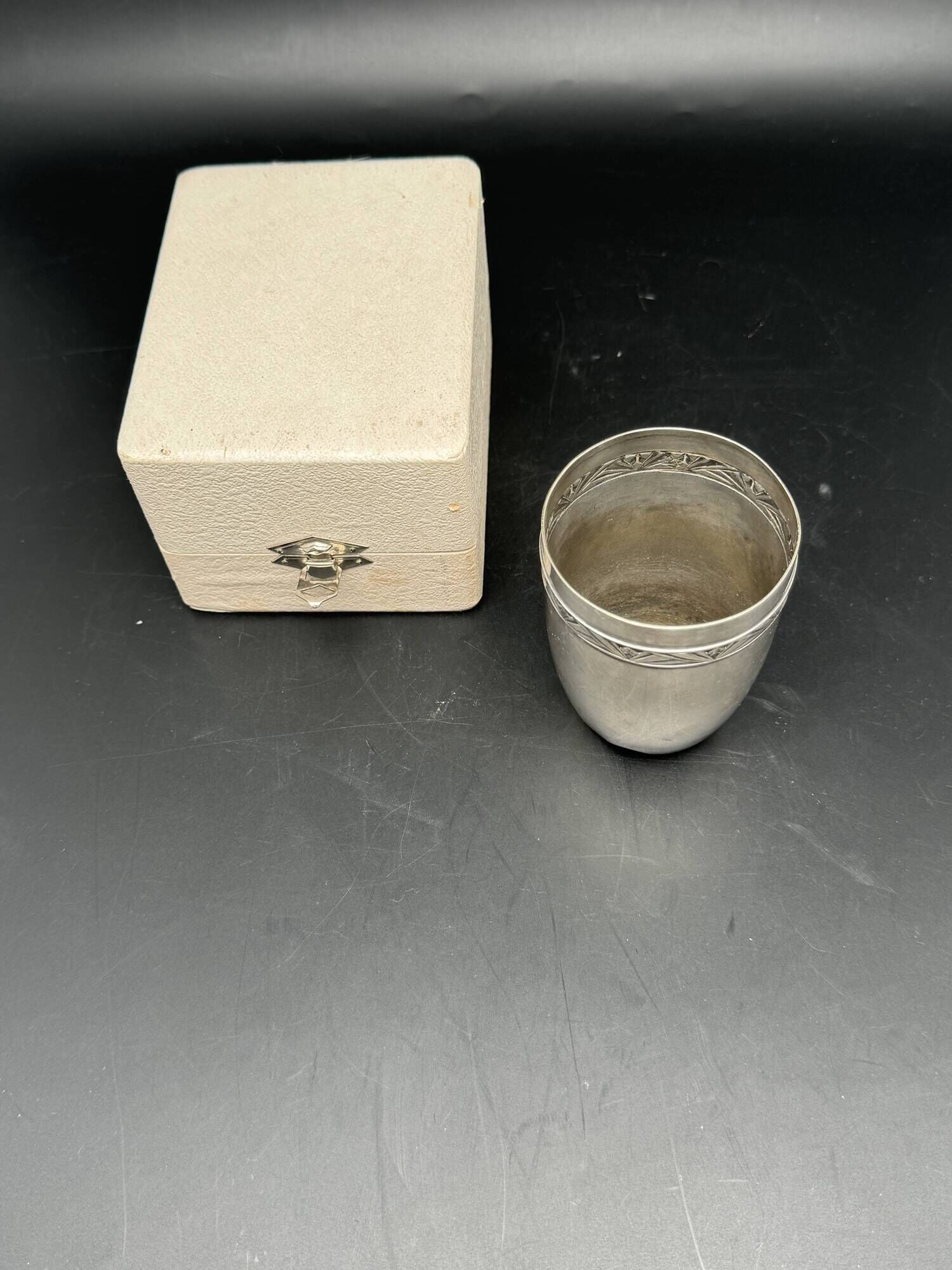 White metal (silverware) cup in its original box