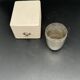 White metal (silverware) cup in its original box