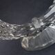 70s chiseled crystal chandelier duo