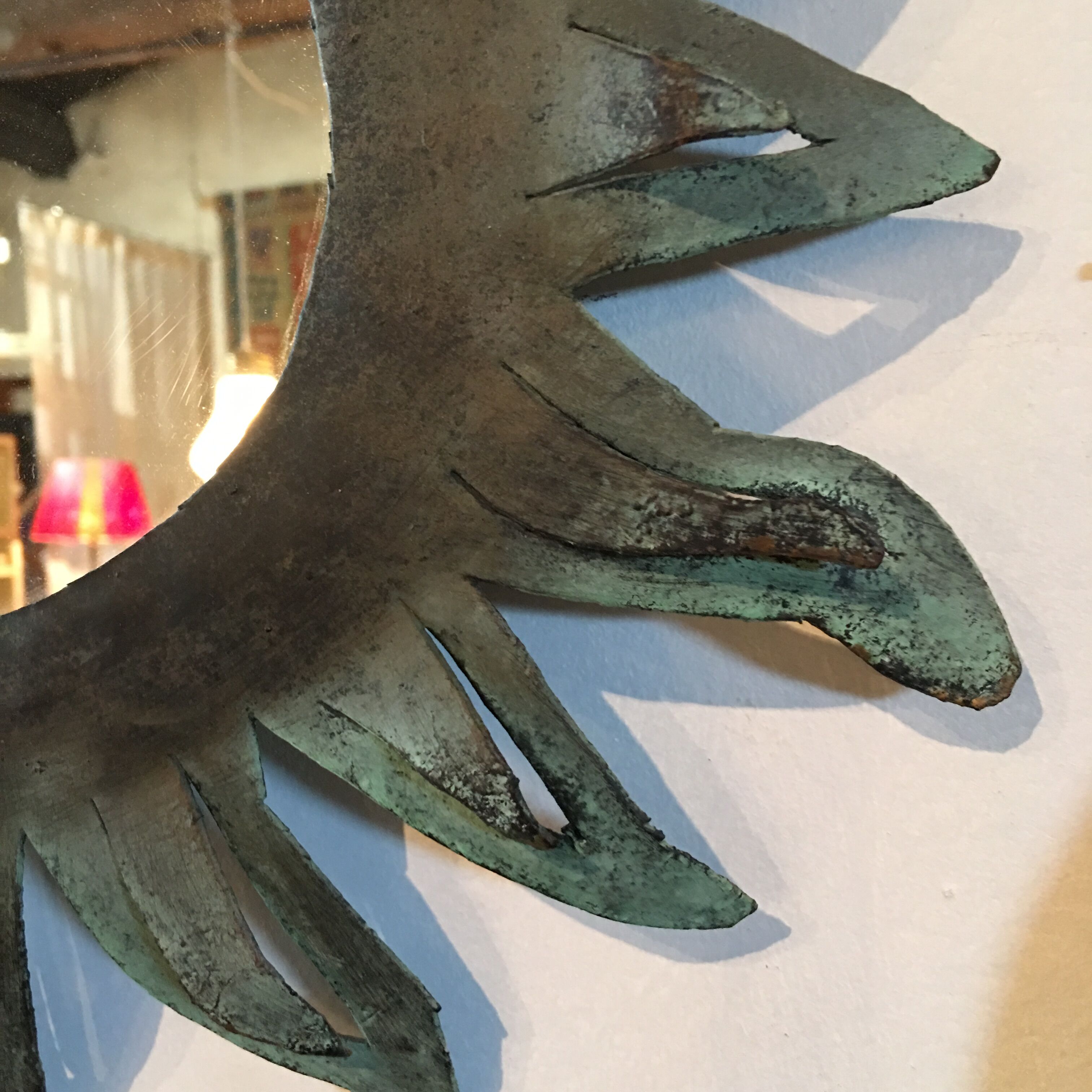 Sun patinated metal mirror 35cm