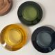 Set of 3 stackable glass catchalls with a teak base.