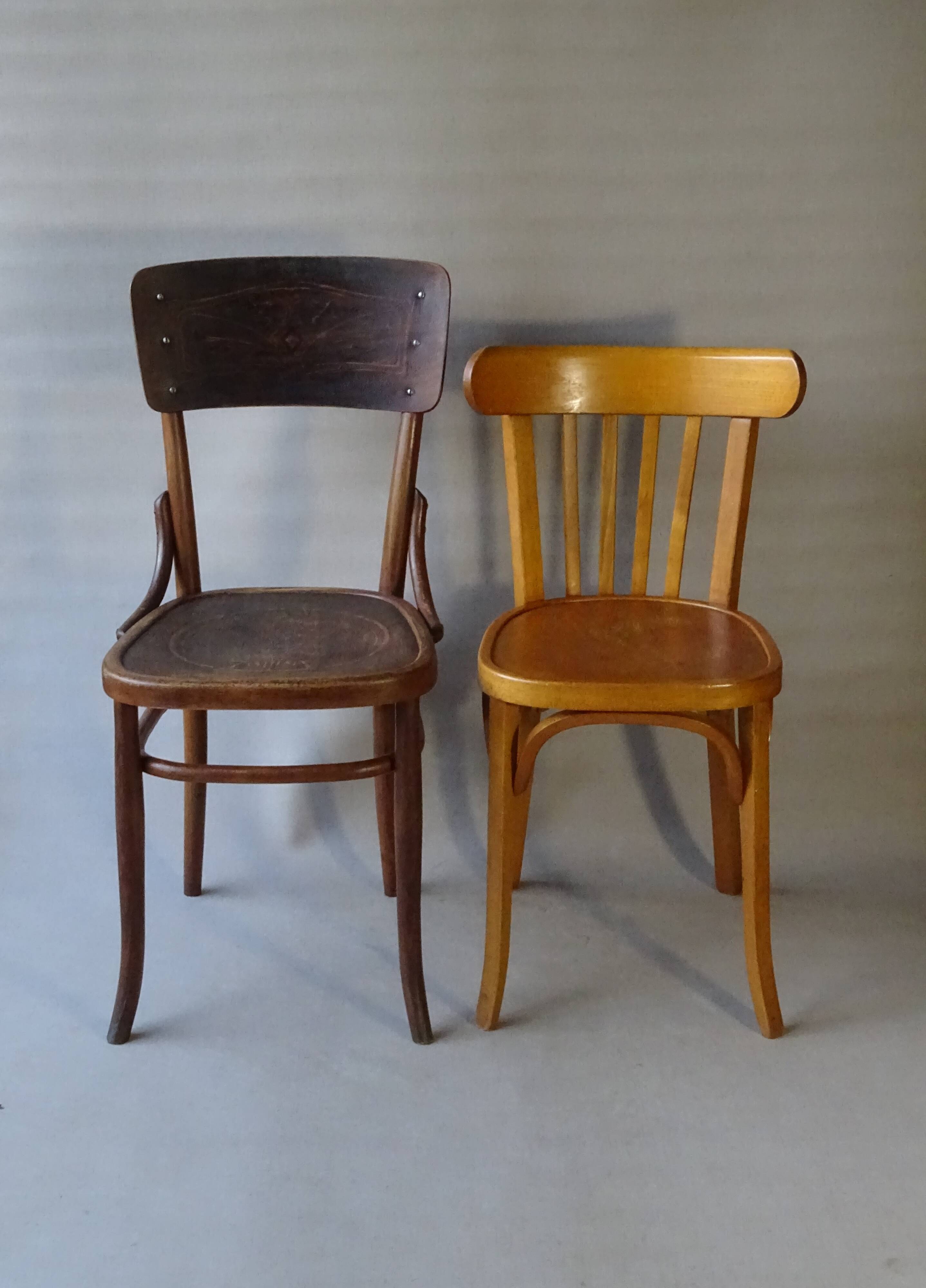 Set of 36 mismatched Bistrot chairs, 1920 to 1950, wooden seats.