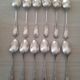 Box of 12 small old spoons in silver metal