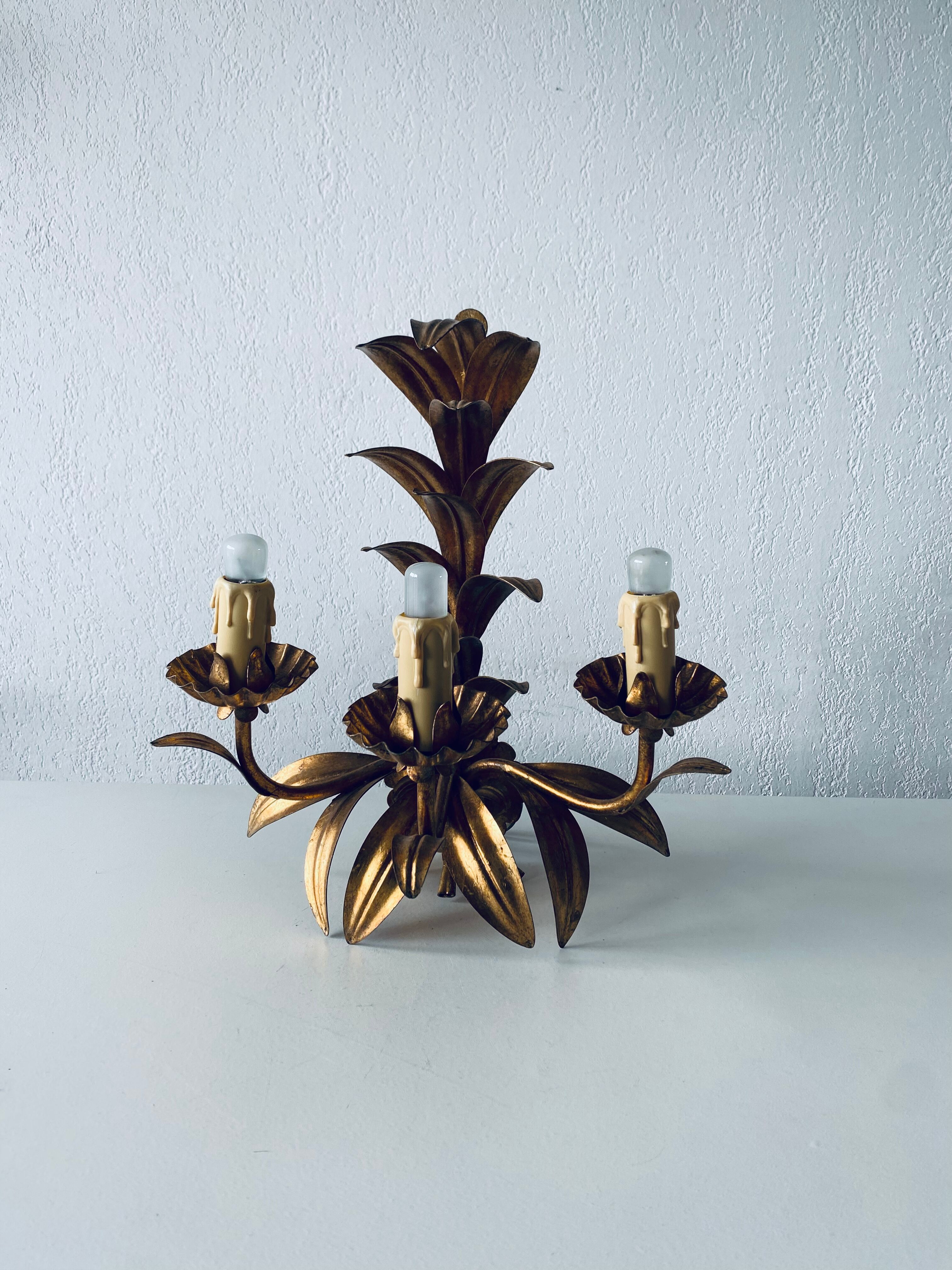 Golden leaf wall light