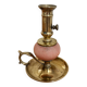Pink glass and brass candlestick