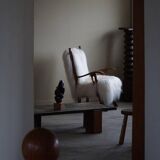 Pair of Scandinavian armchairs in oak and long-haired Icelandic sheepskin by Henning Kjærnulf, 1950.