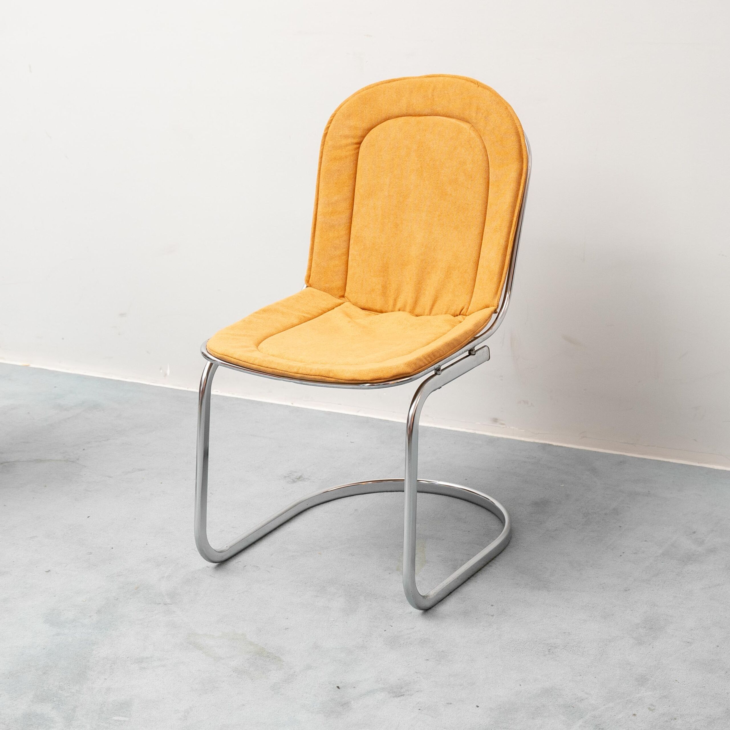 Set of 4 vintage Gastone Rinaldi chairs in chromed steel and yellow fabric, 1970s modernism