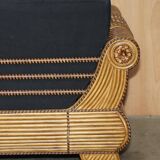 Vintage 1970s canapé with bamboo frame and Aztec patterns.