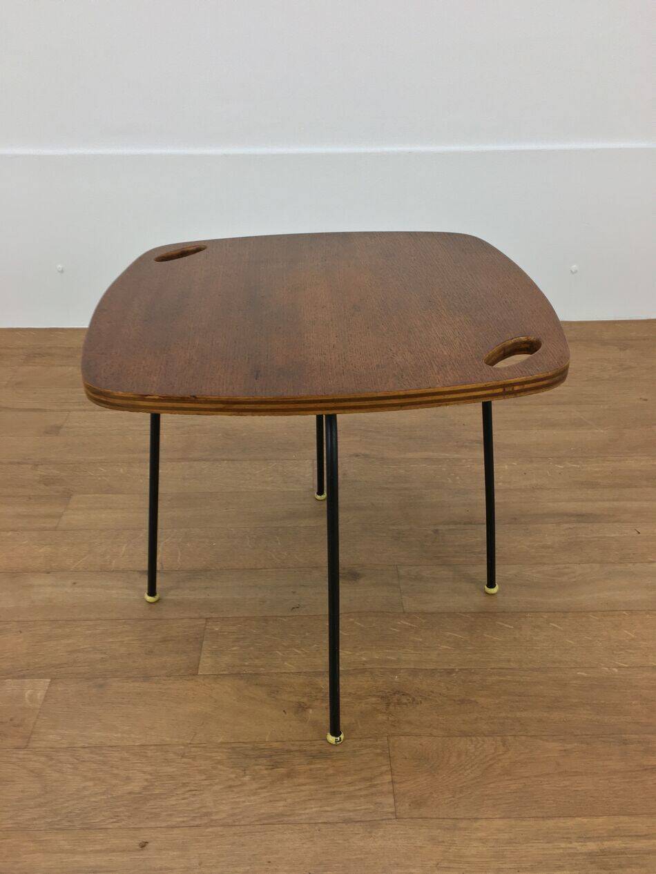Modernist side table, 1950s, wood and metal, with handles.