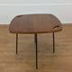Modernist side table, 1950s, wood and metal, with handles.