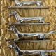 12 antique silver-plated bronze knife rests in modern art deco animal designs.
