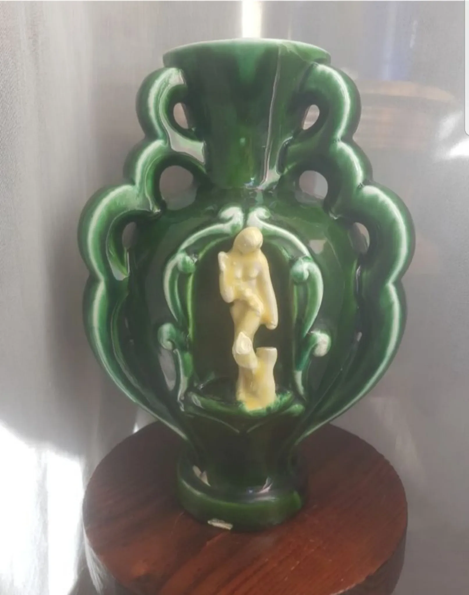 Earthenware vase with 3 caryatids