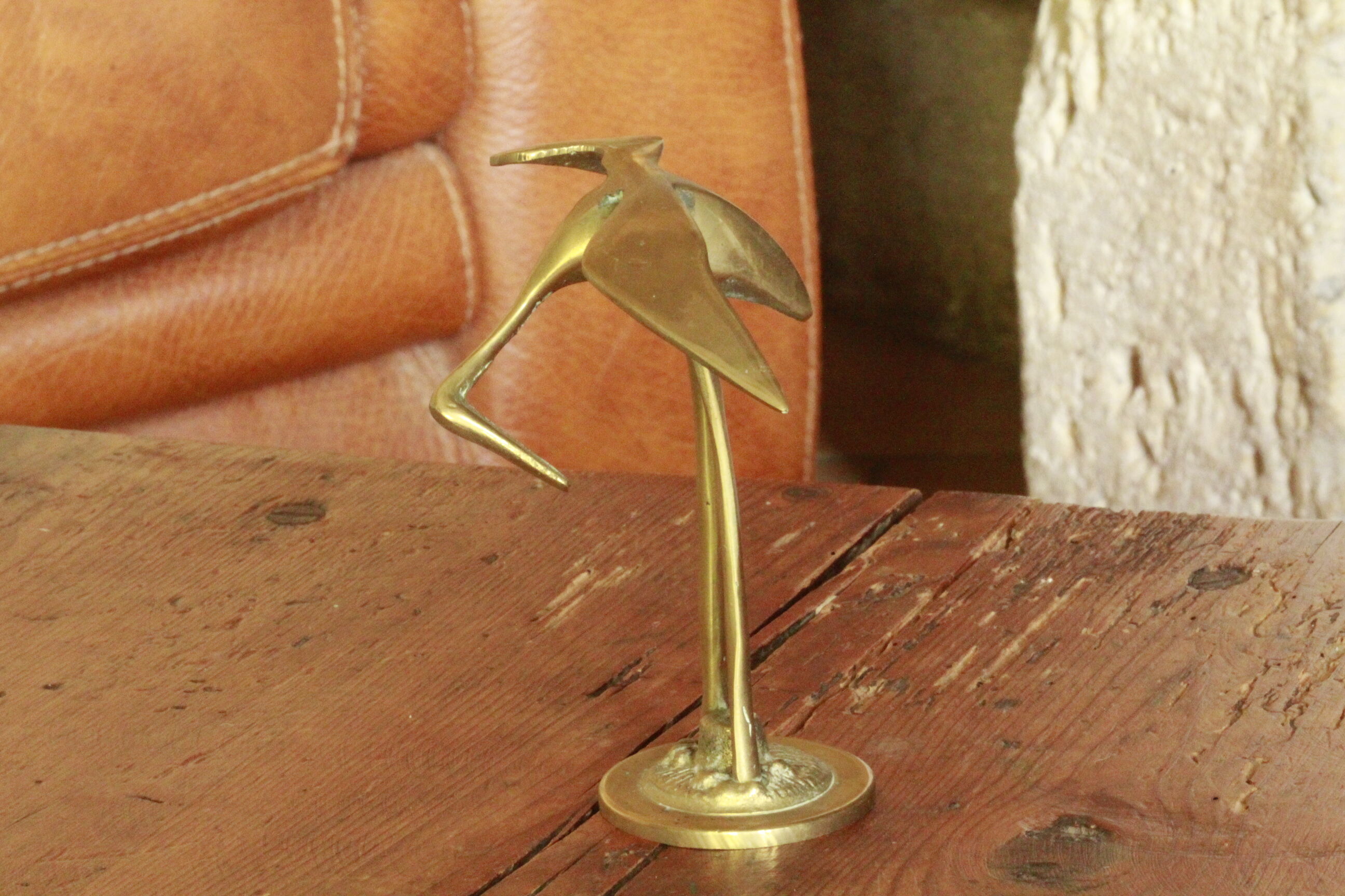 Brass heron statue