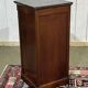 Empire bedside table from the 19th century in cherry wood and black marble.