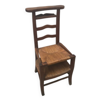 Chair prays to God circa 1900