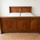 Double bed 160 cm in solid walnut with electric mattress base.