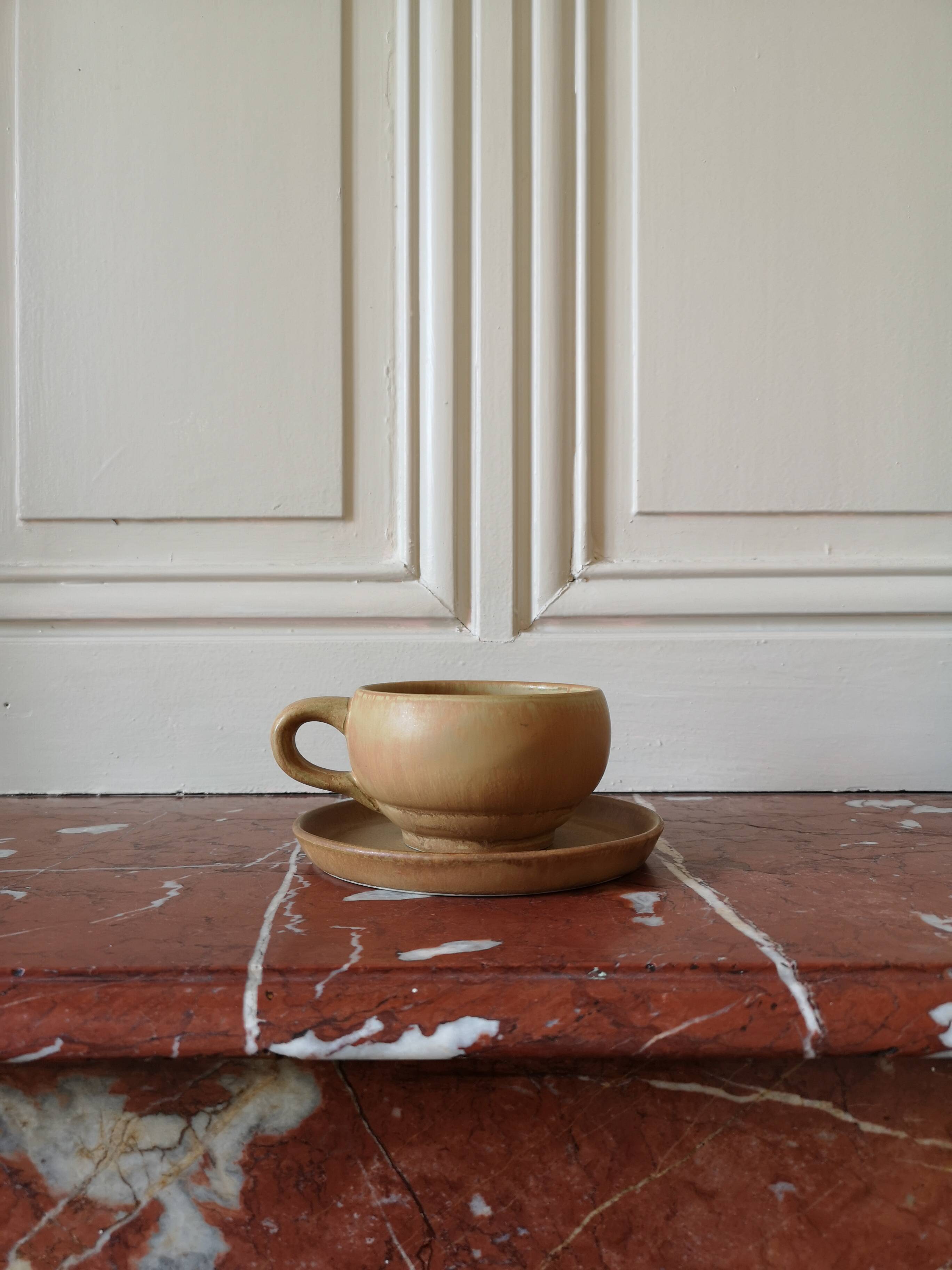 Vintage stoneware teapot and cup, "selfish" tea service, signed