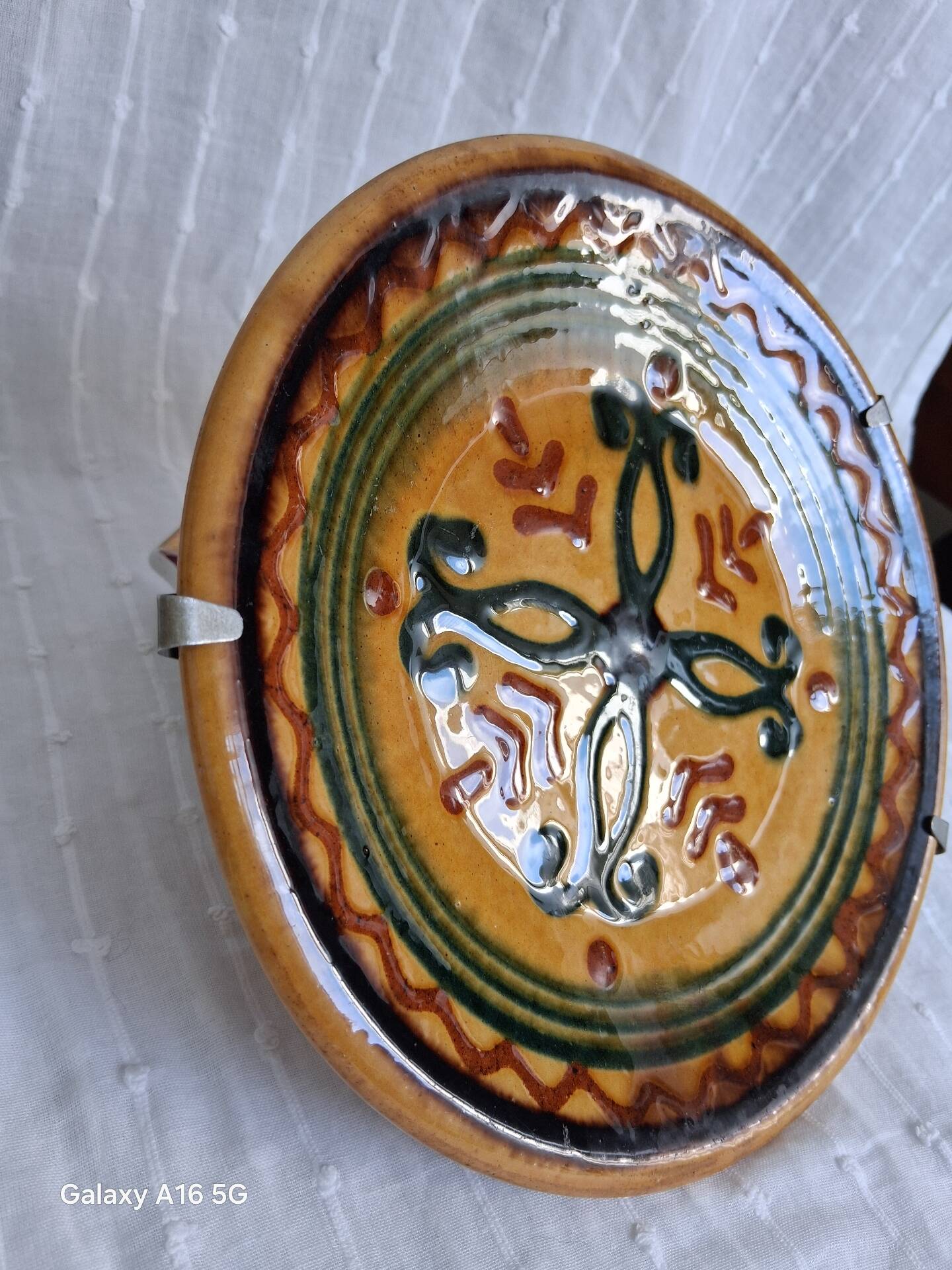Decorative glazed earthenware plate stamped Biot, 18 cm. Vintage.