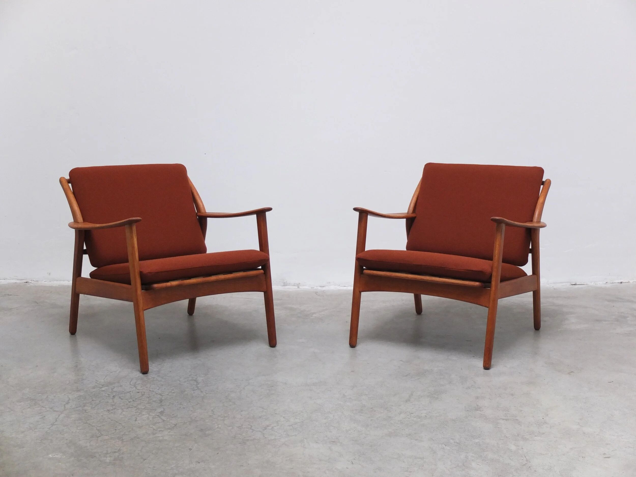 Danish pair of easy chairs in oak by Niels Koefoed, 1960s