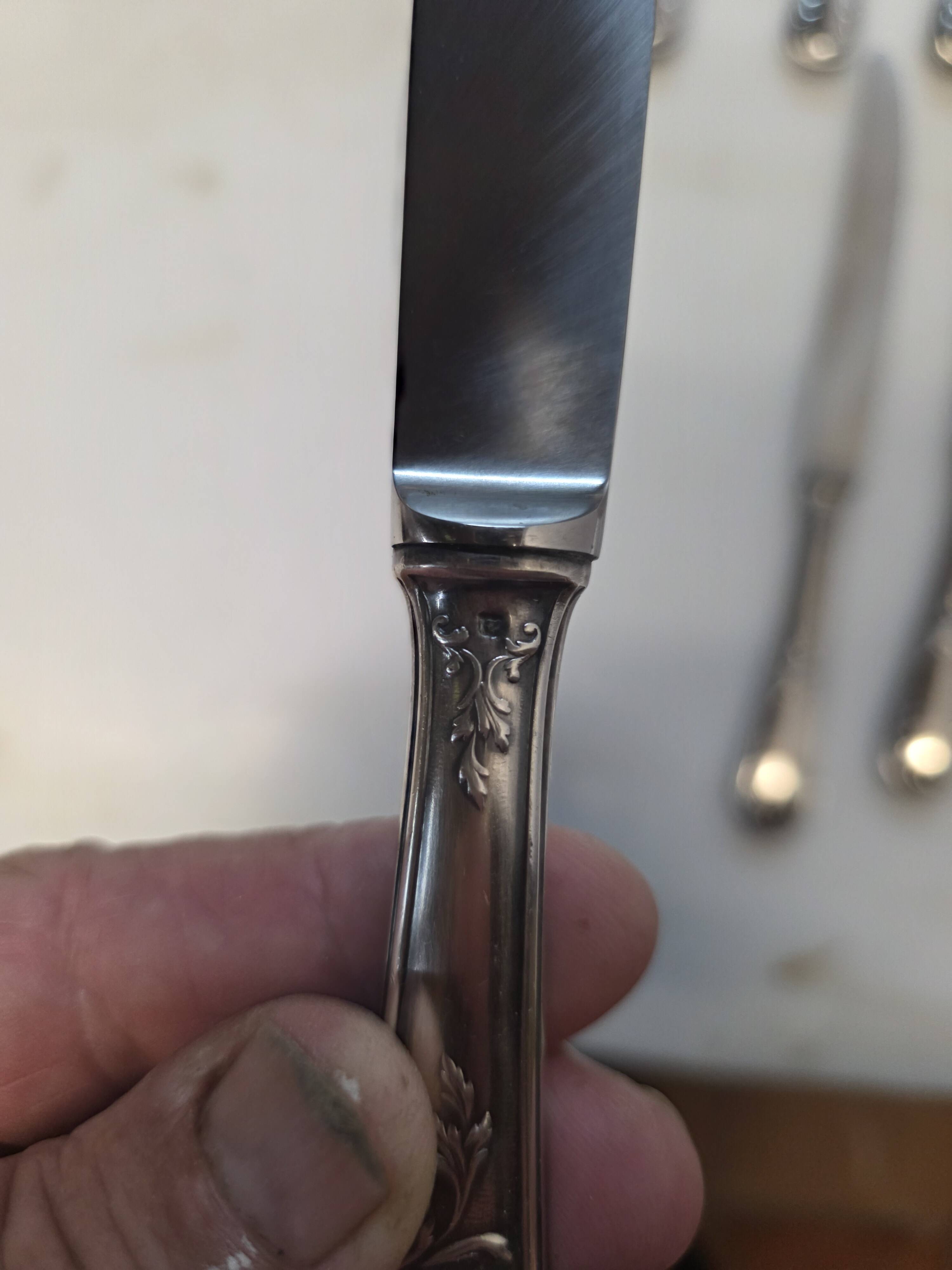 12 silver-plated knives