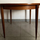 Scandinavian round teak dining table from the 60s extendable