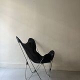designer butterfly armchair in chrome and black leather