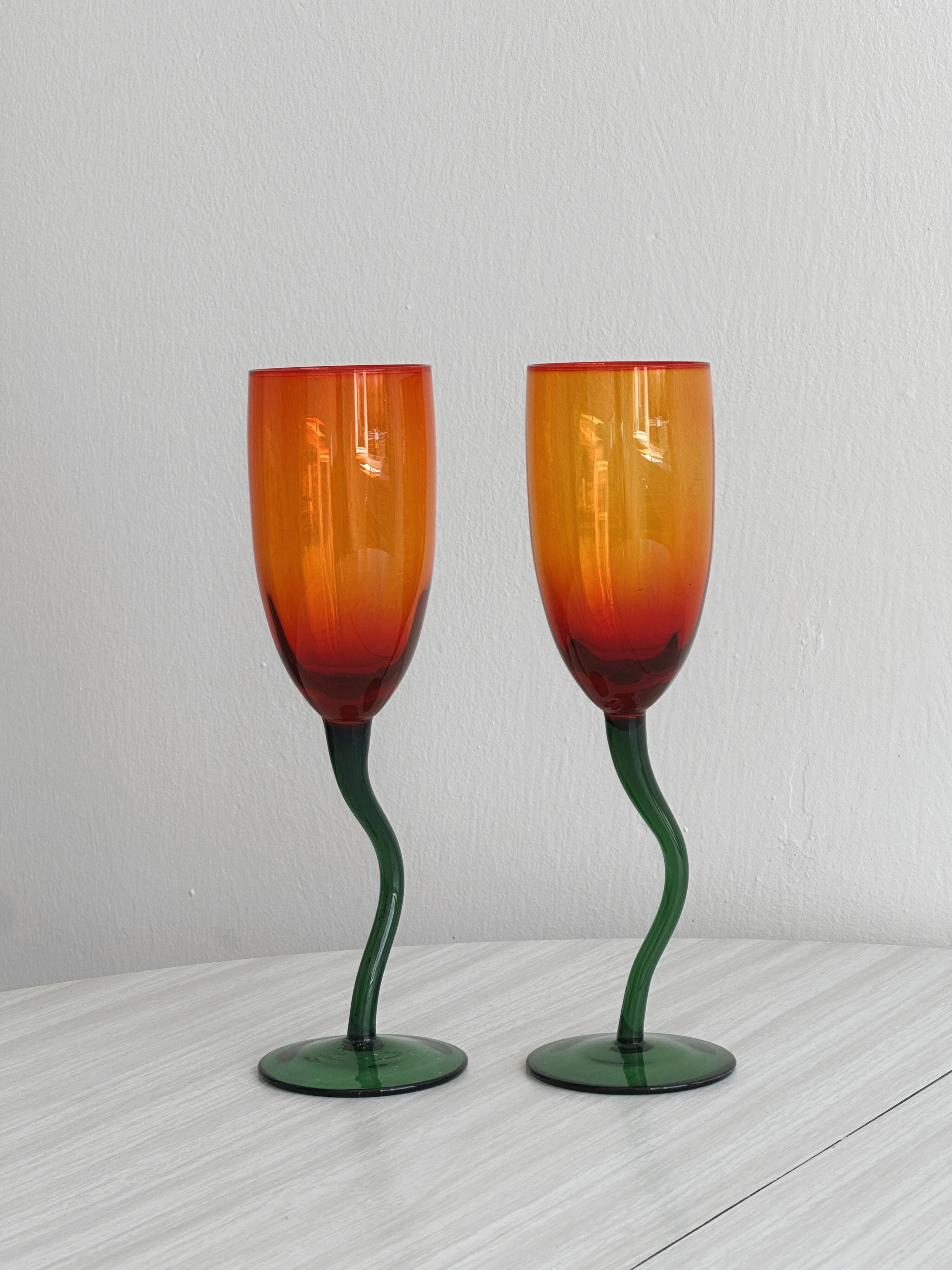 Pair of hand-blown orange glasses