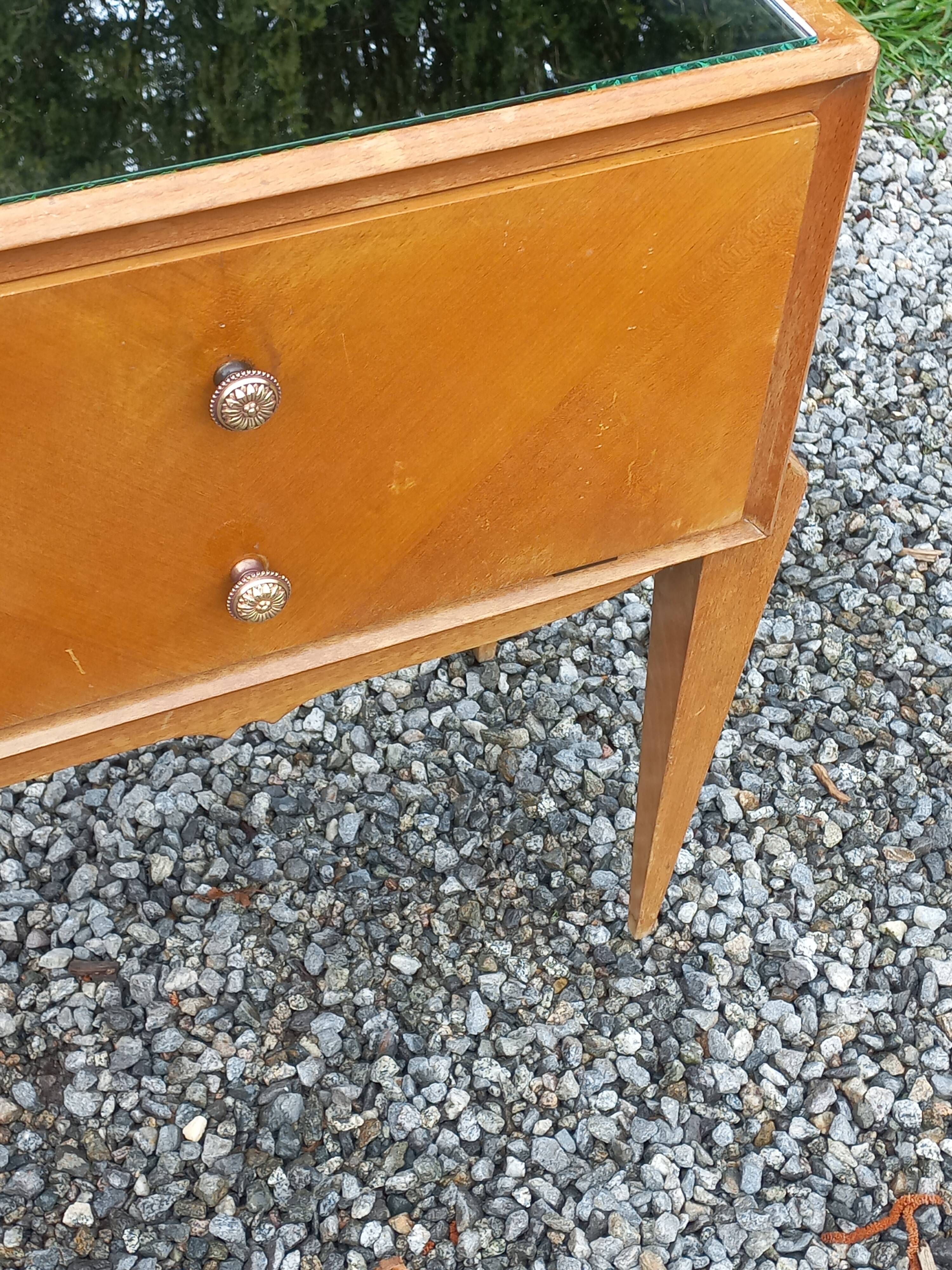 Vintage pair of bedside tables from the 1950s in sycamore and a mirror.