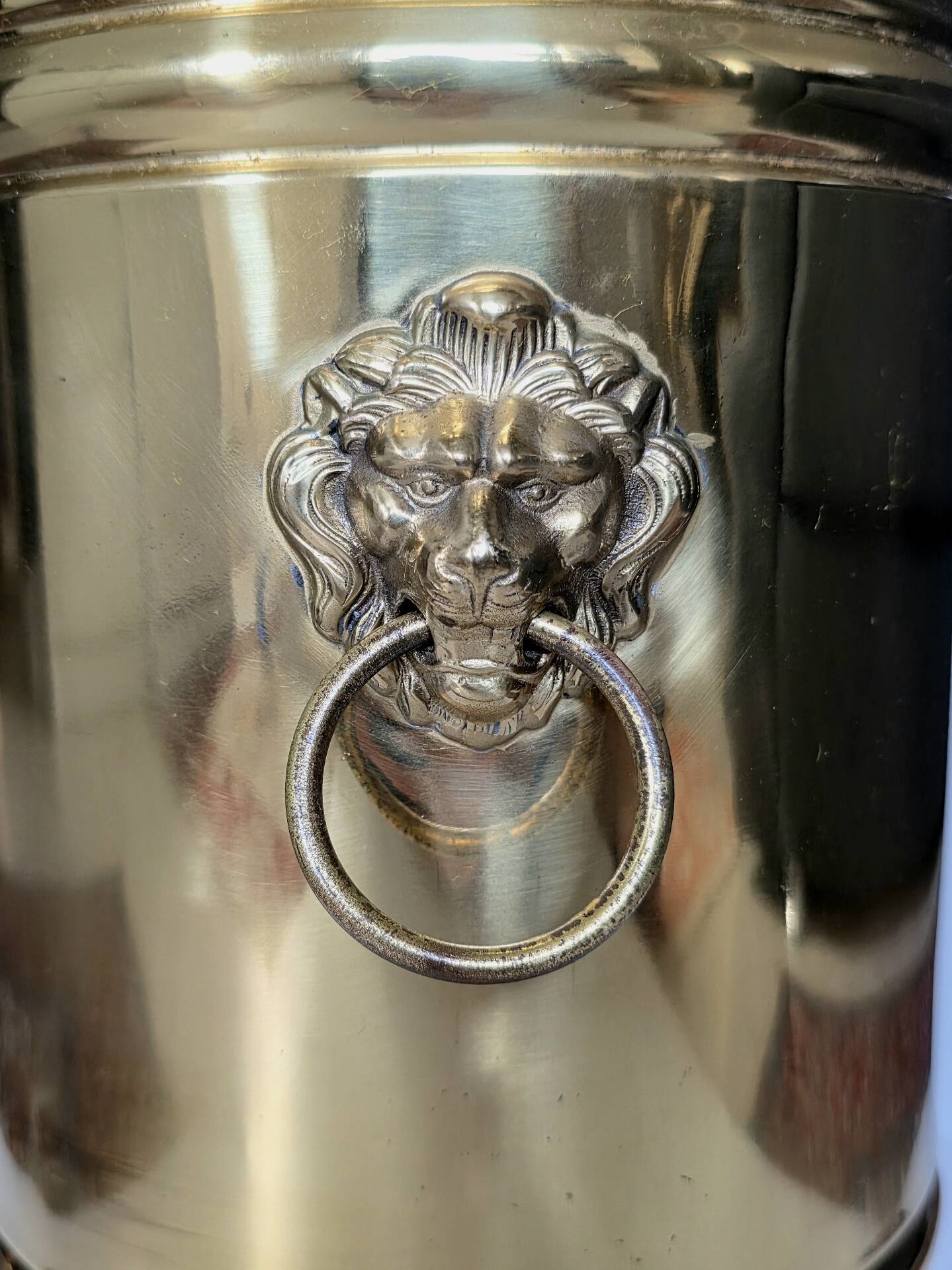 Hollywood Regency style umbrella stand, brass finish and lio pattern.