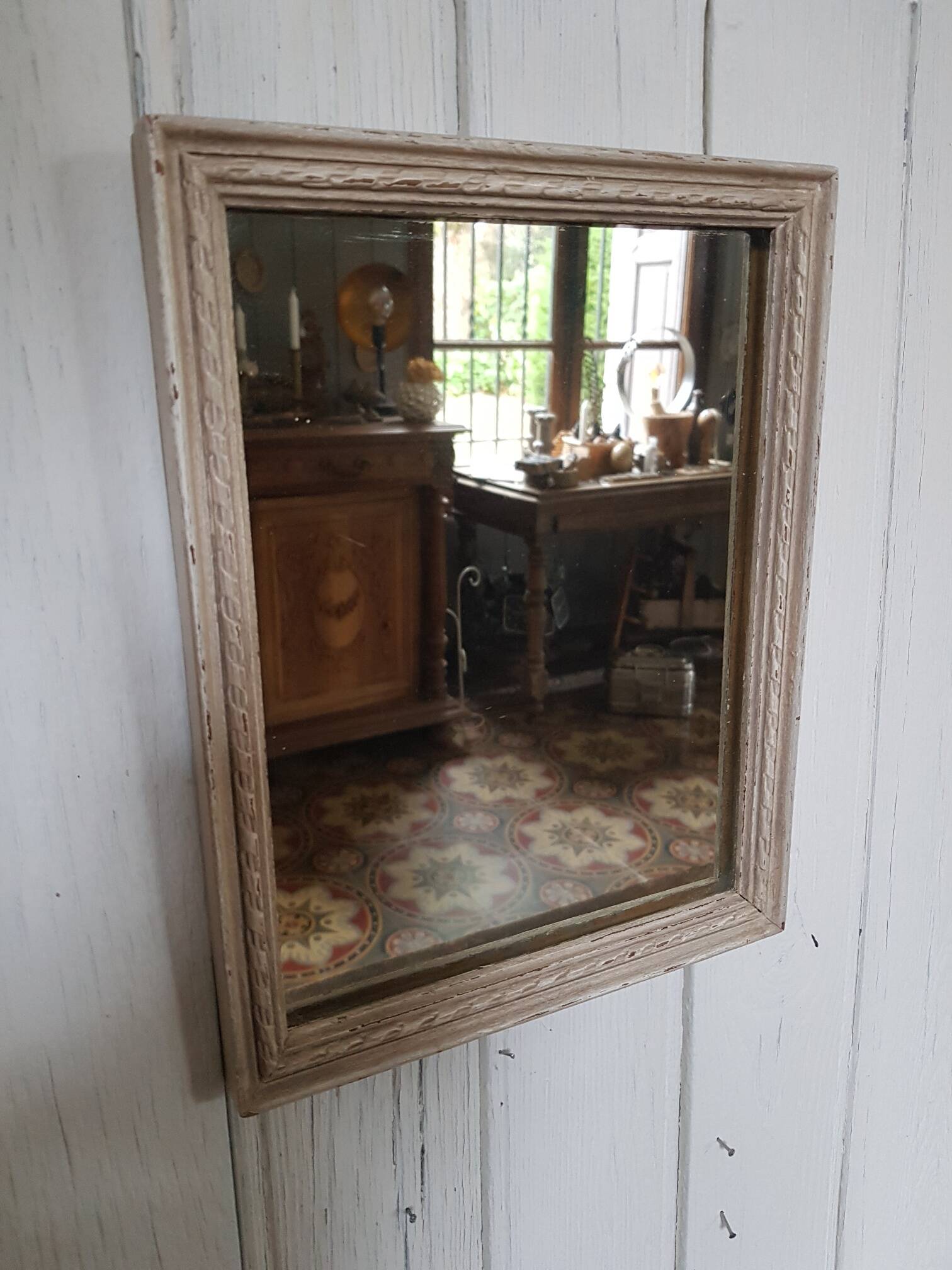Small patinated wooden linen mirror
