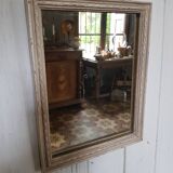 Small patinated wooden linen mirror