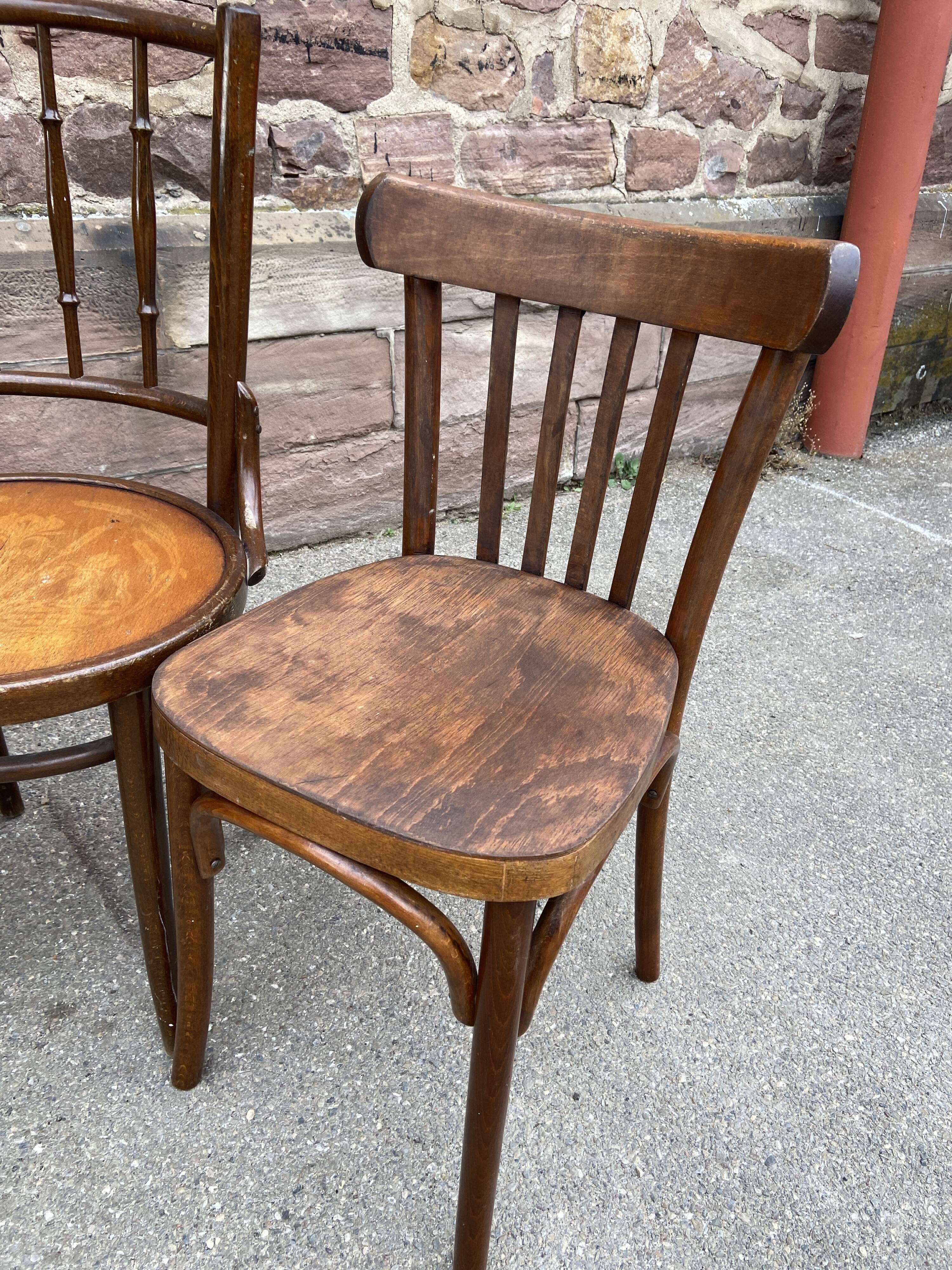 Lot 6 mismatched wooden bistro chairs