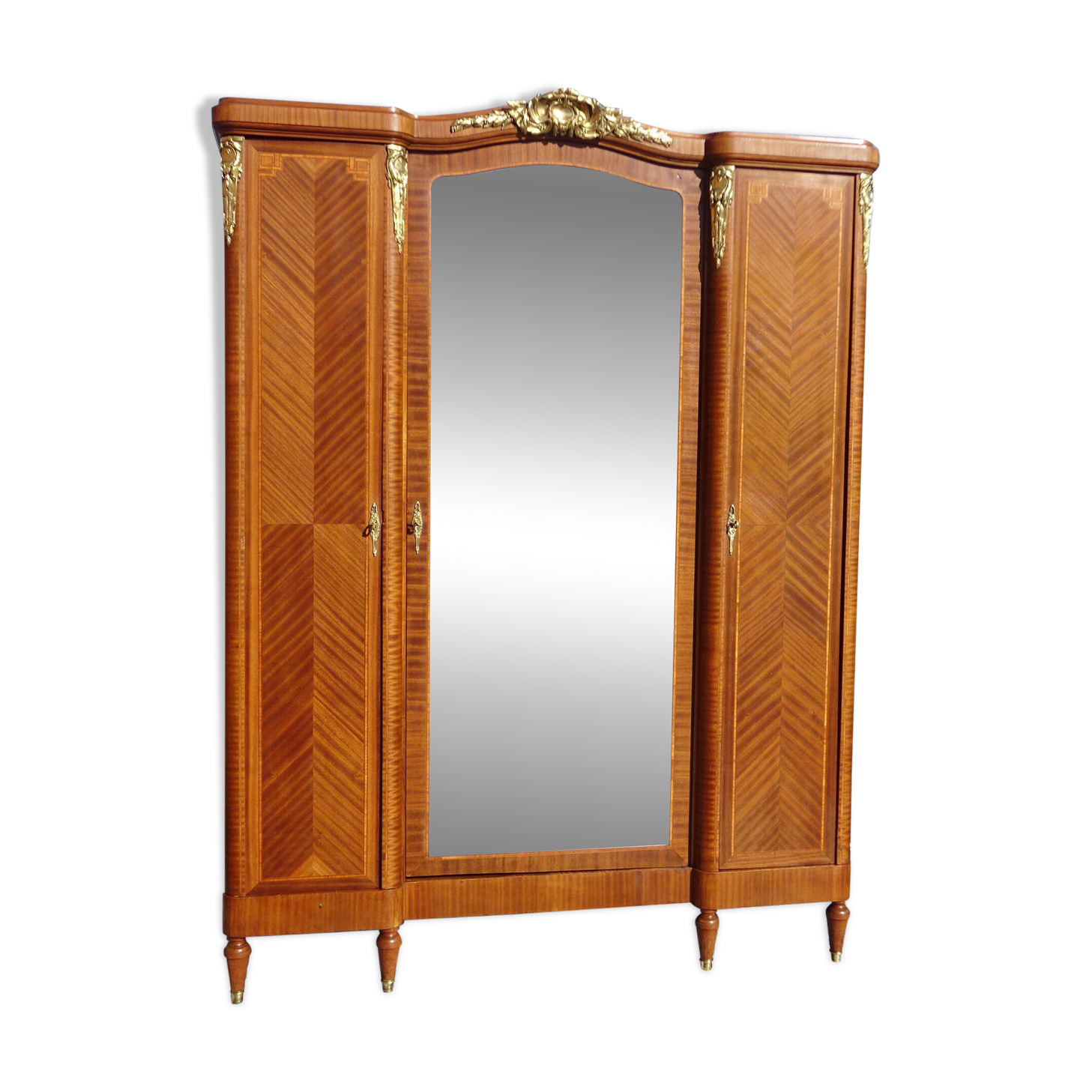 Old three-door wardrobe