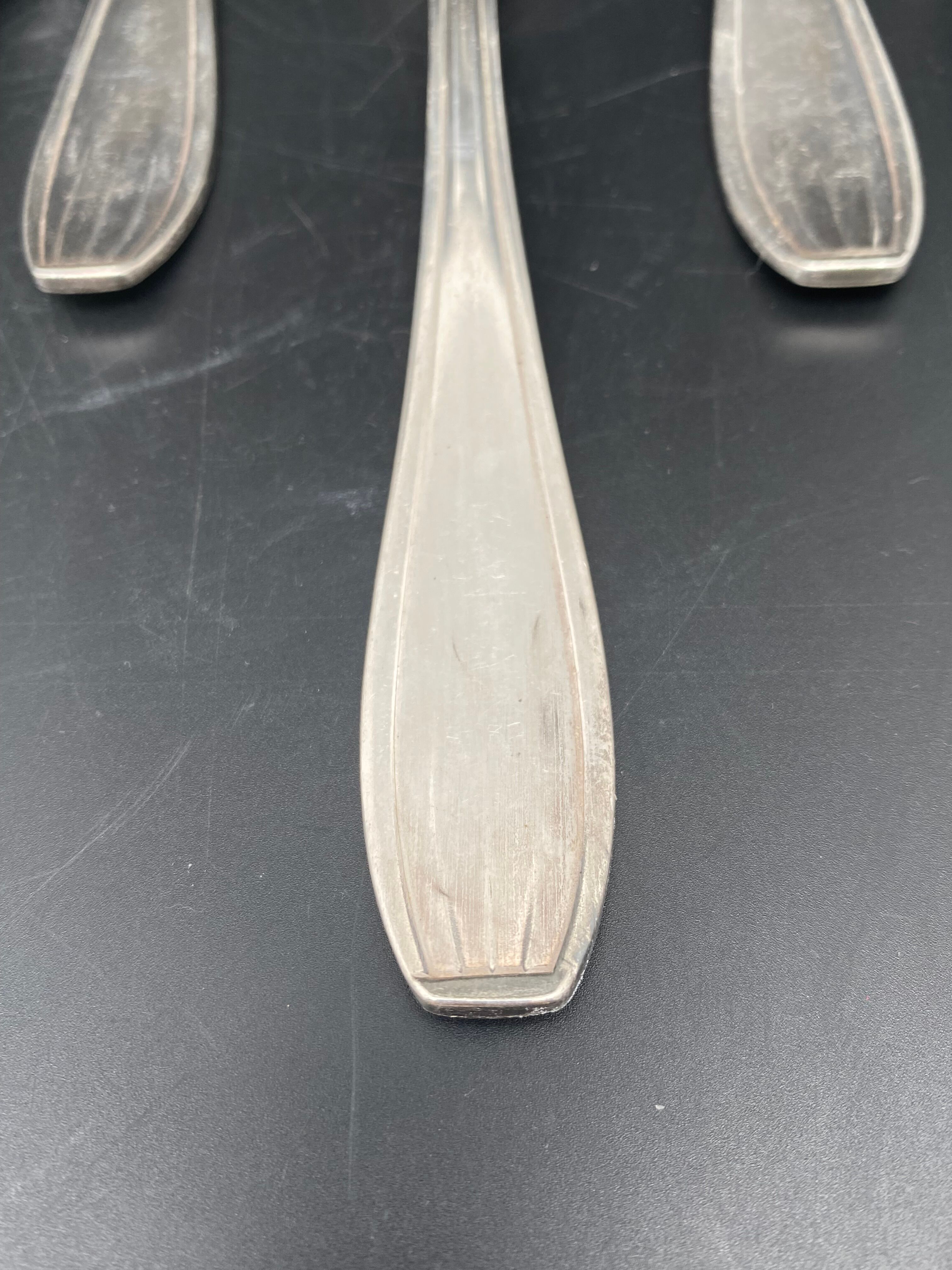 Silver metal cutlery