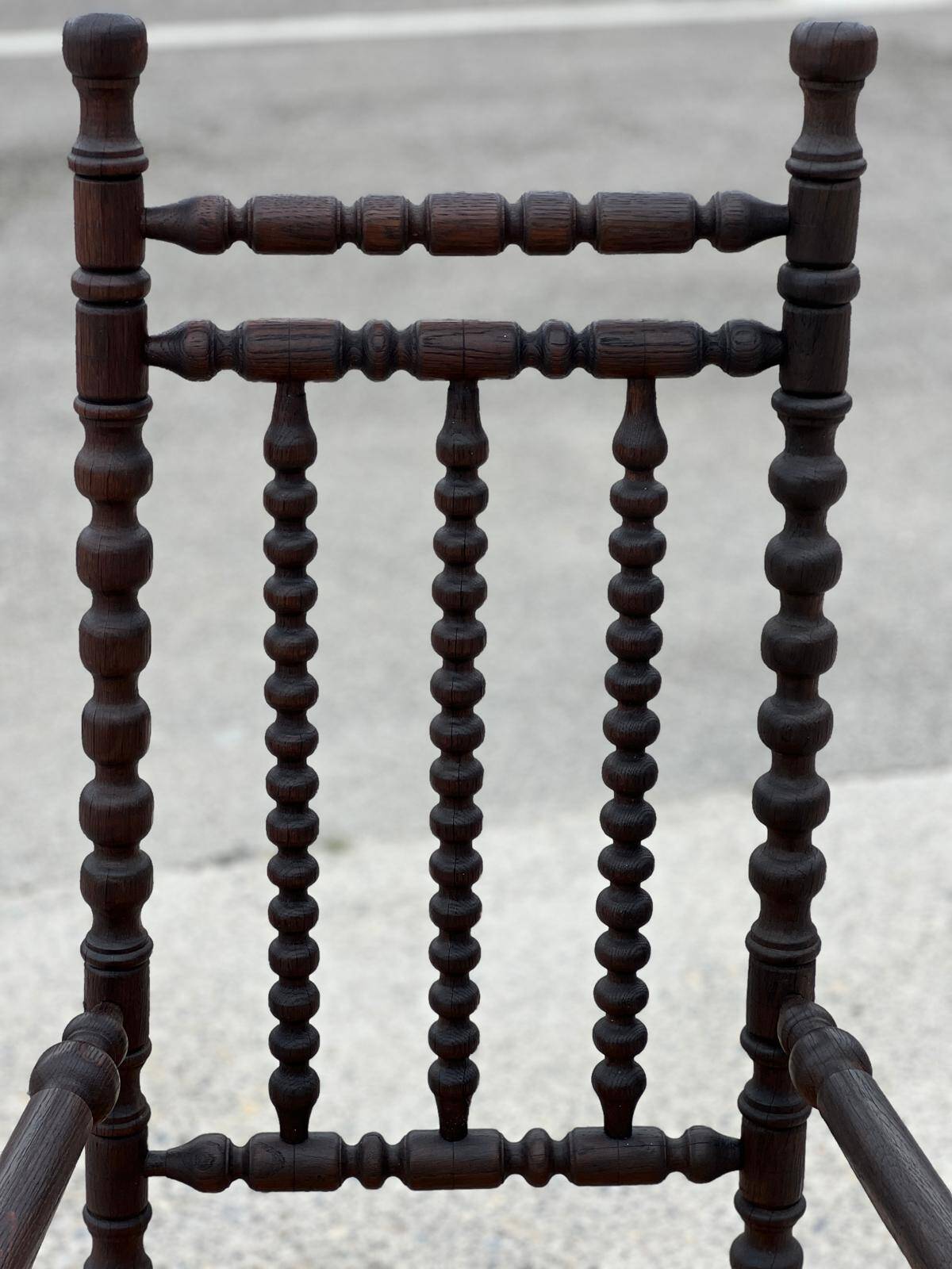 Chair called Bobbin in stained oak, 1930