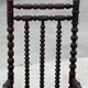 Fauteuil dit Bobbin en chêne teinté, 1930