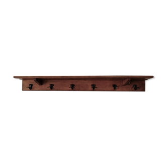Old schoolboy coat holder