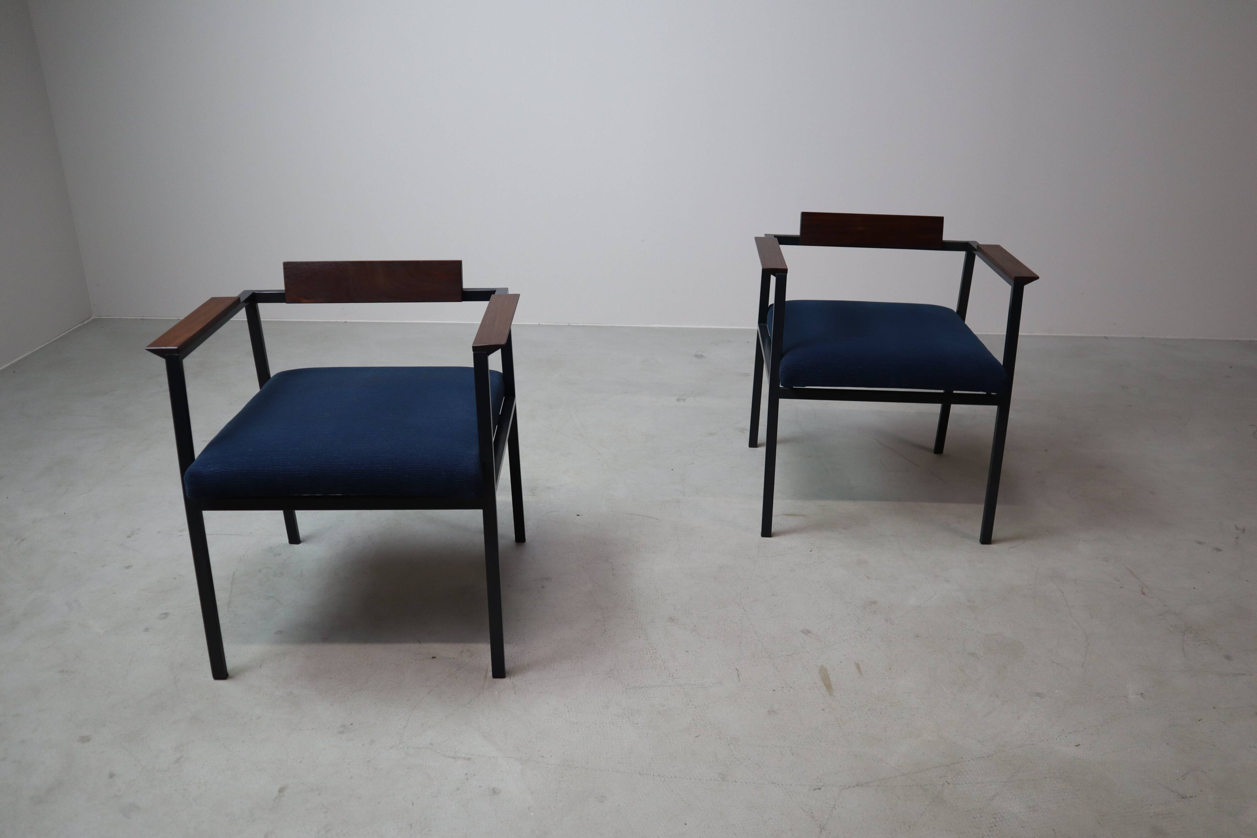 Pair of Postmodern armchairs in steel and mahogany, 1970s